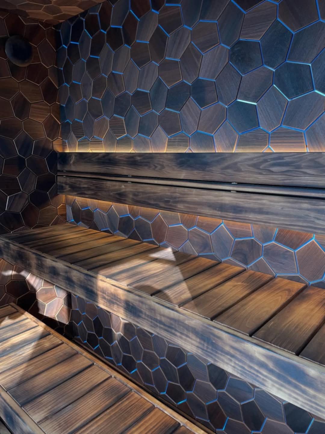 Cool blue-lit sauna interior